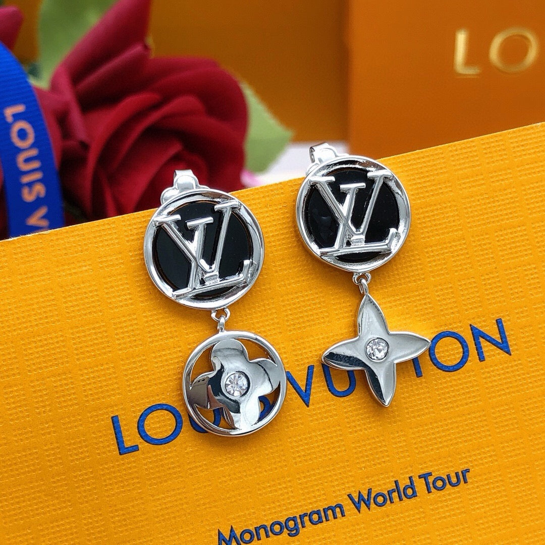 Martin Graham stud earrings in polished metal-tone – front product view