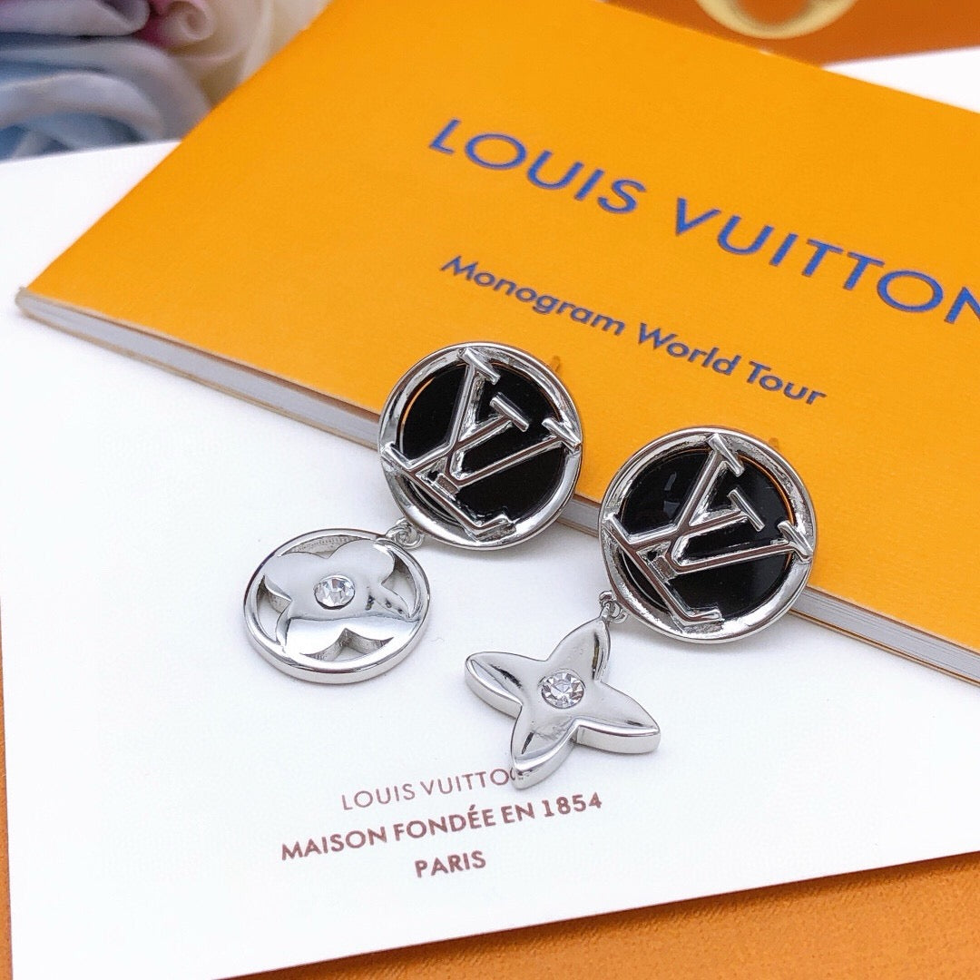 Martin Graham stud earrings in polished metal-tone – detail view