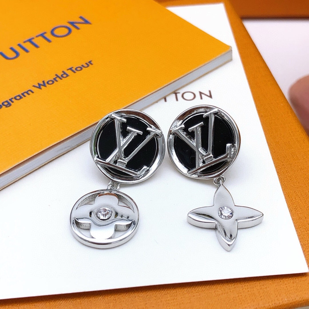 Martin Graham stud earrings in polished metal-tone – styled product view