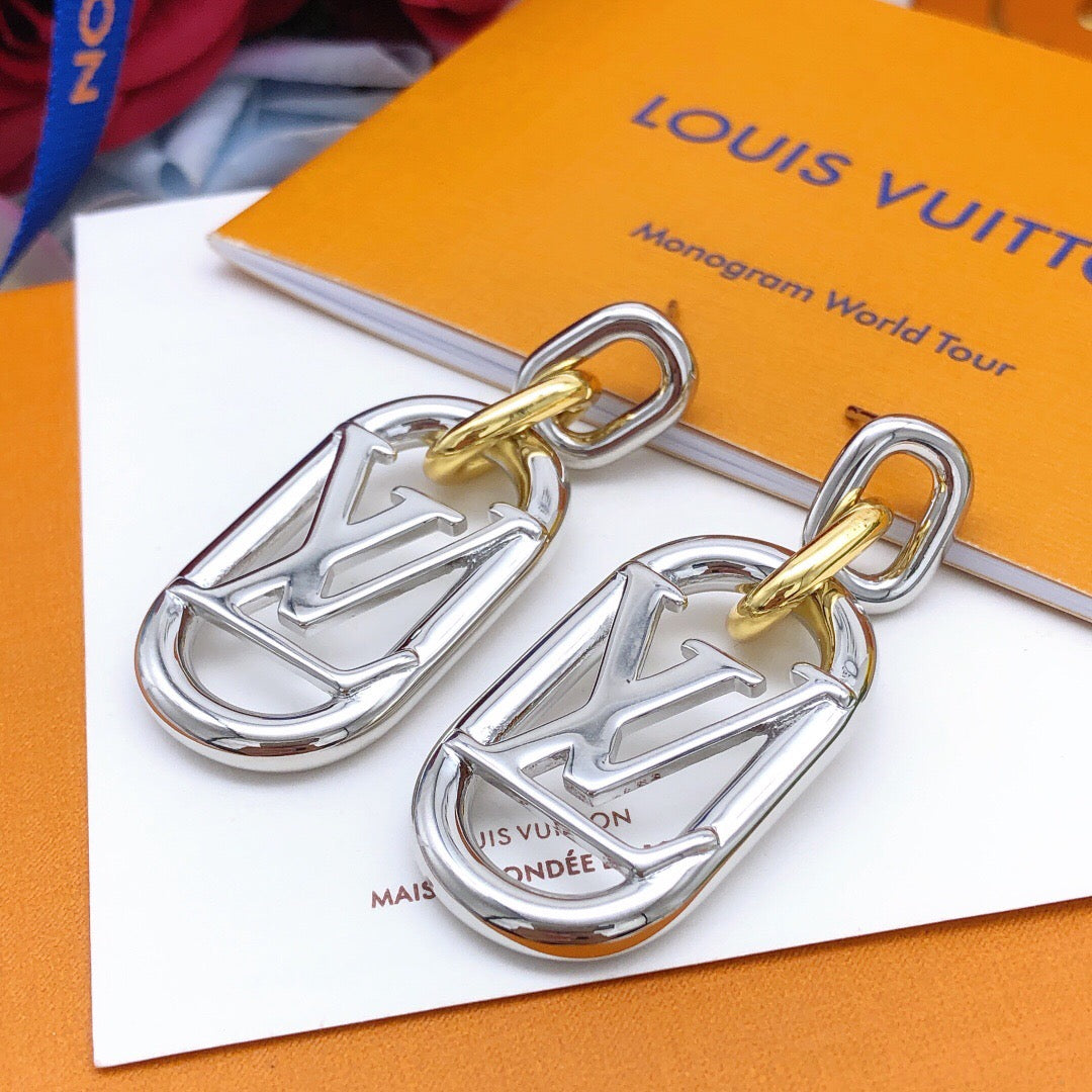Martin Graham stud earrings in polished metal-tone – styled product view