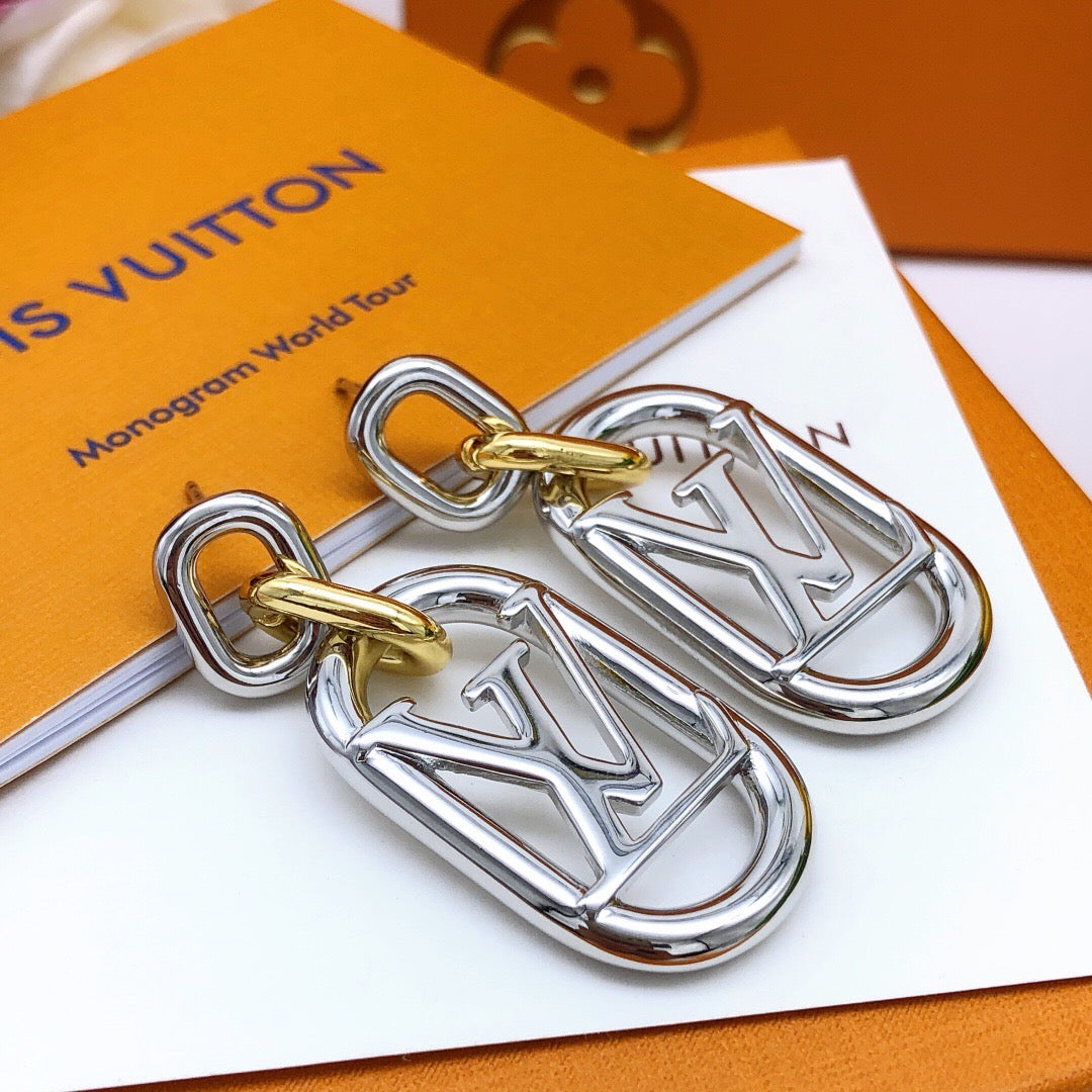Martin Graham stud earrings in polished metal-tone – side detail