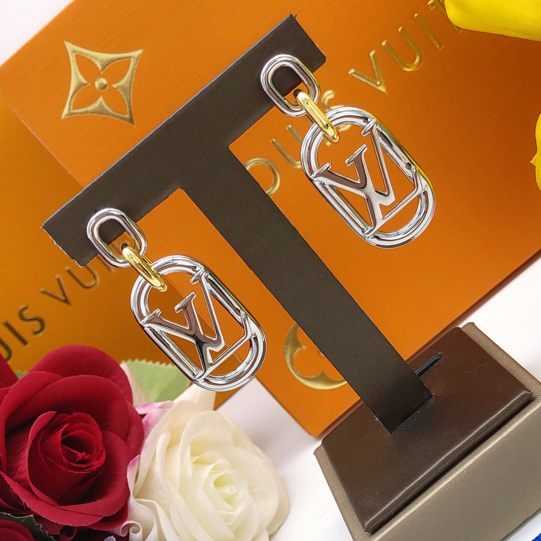 Martin Graham stud earrings in polished metal-tone – front product view