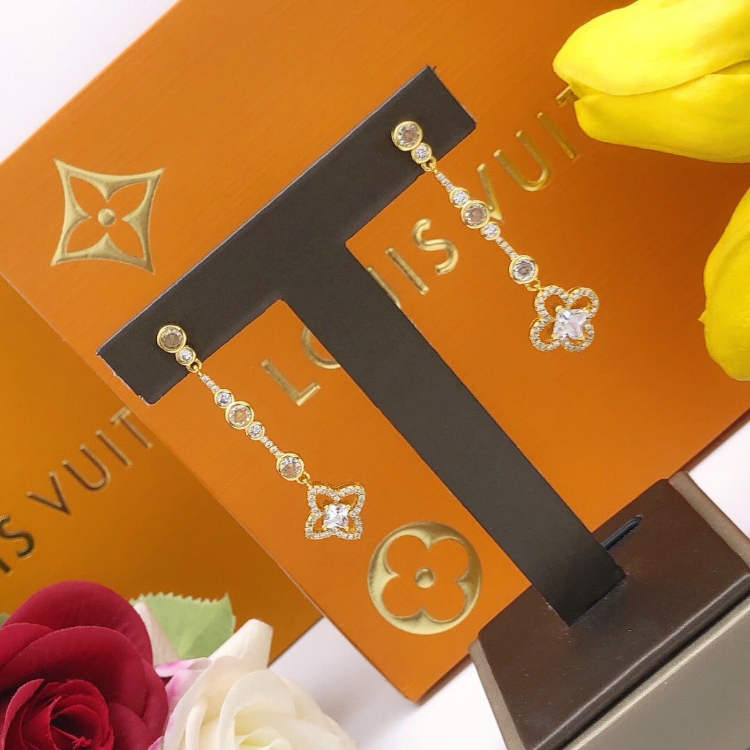 Martin Graham stud earrings in polished metal-tone – front product view