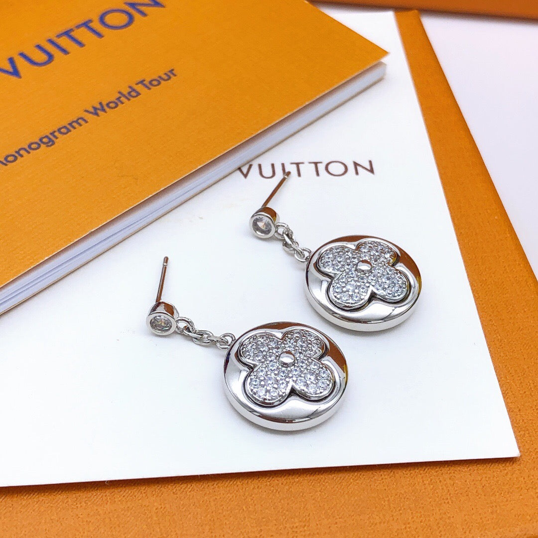 Martin Graham stud earrings in polished metal-tone – front product view