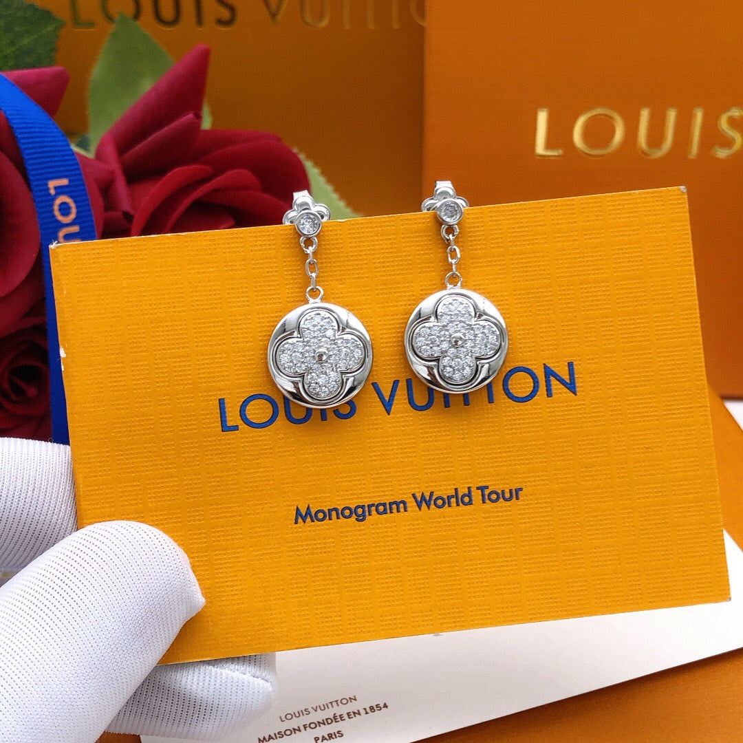 Martin Graham stud earrings in polished metal-tone – styled product view