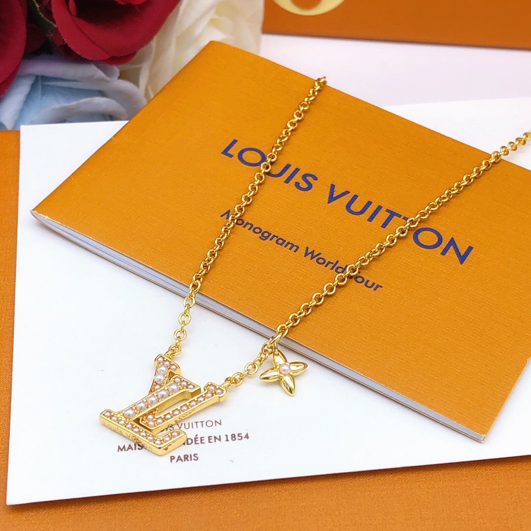 Martin Graham pendant necklace in polished metal-tone – detail view