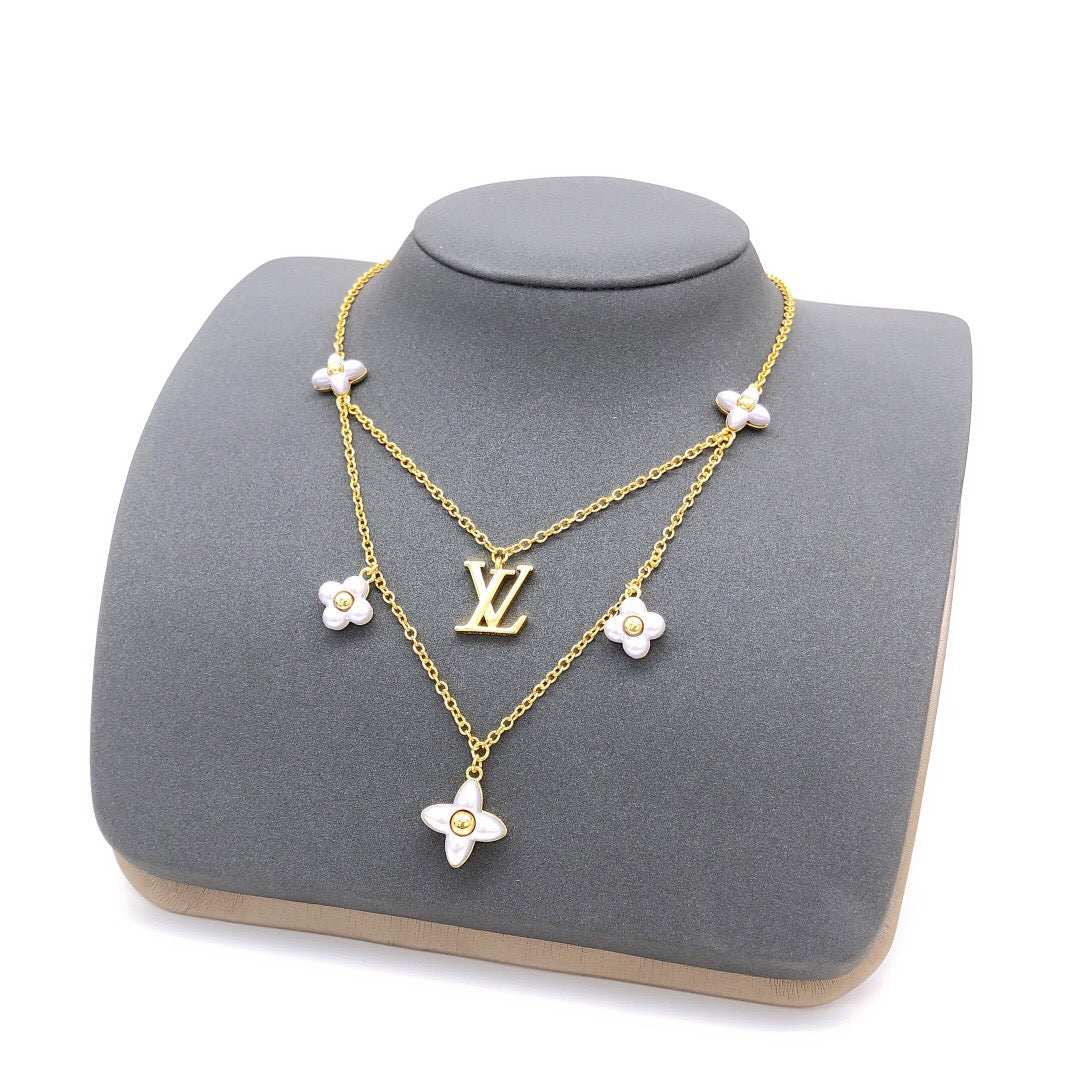 Martin Graham pendant necklace in polished metal-tone – close-up detail