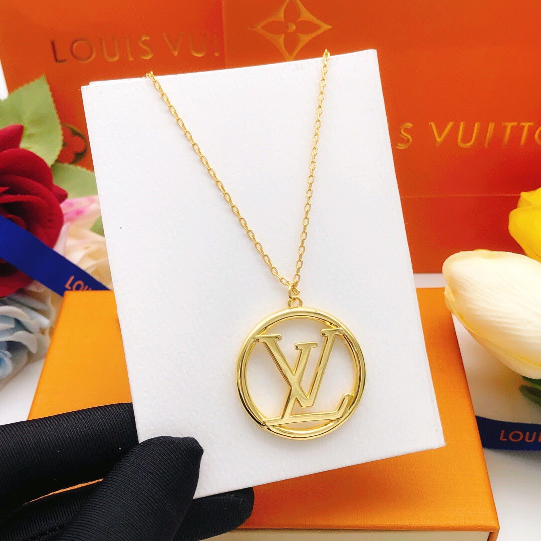 Martin Graham pendant necklace in polished metal-tone – close-up detail