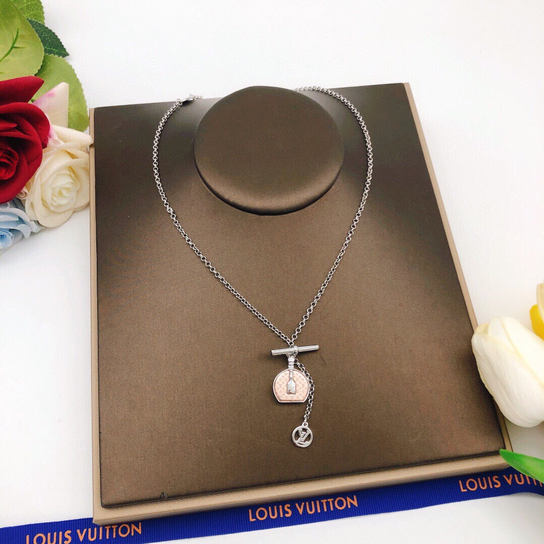 Martin Graham pendant necklace in polished metal-tone – styled product view