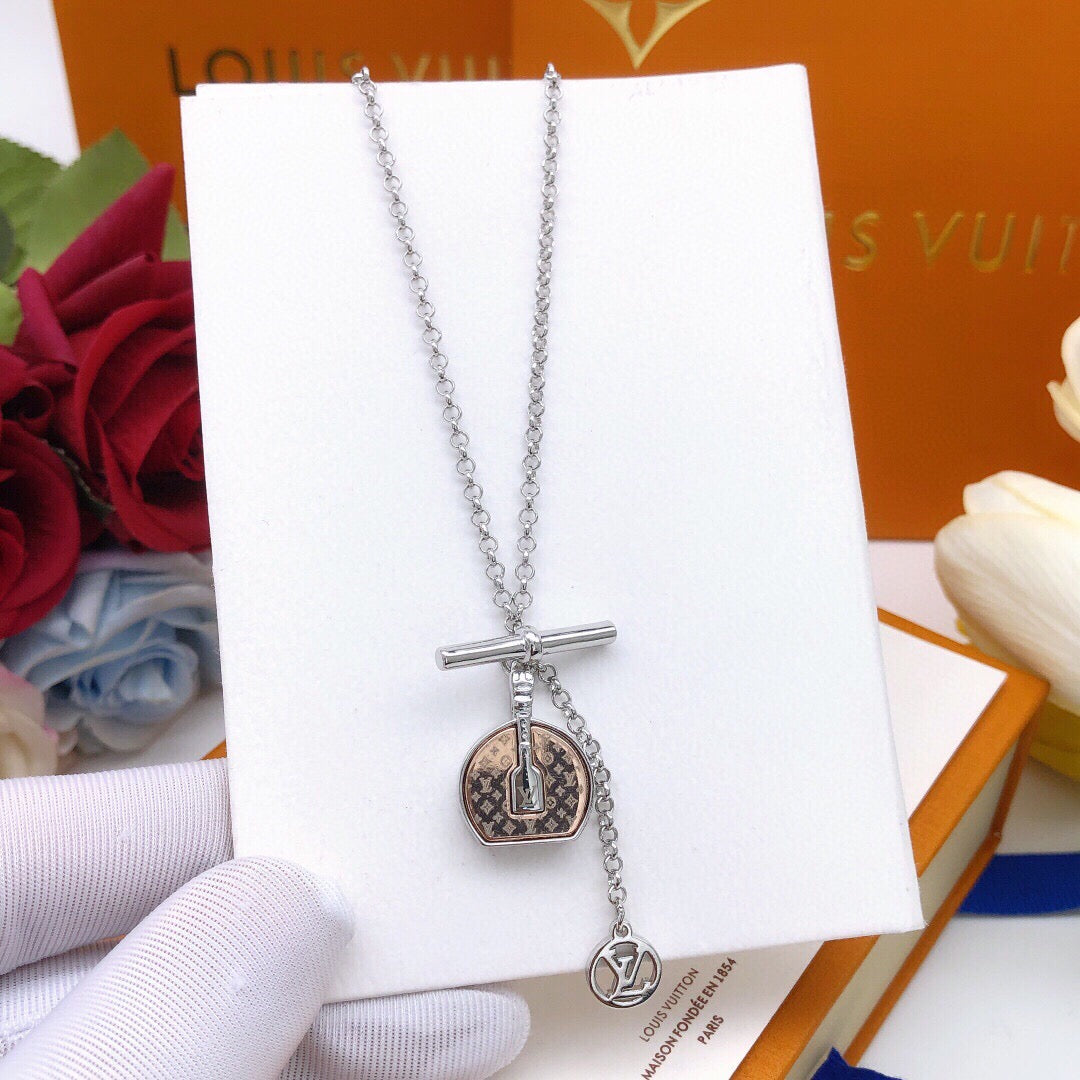 Martin Graham pendant necklace in polished metal-tone – close-up detail