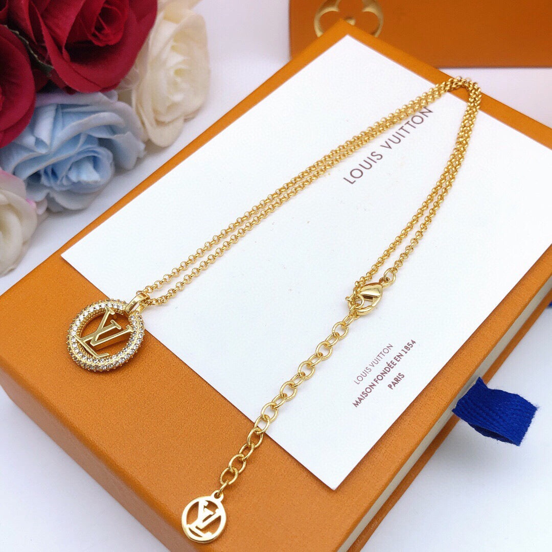 Martin Graham pendant necklace in polished metal-tone – close-up detail