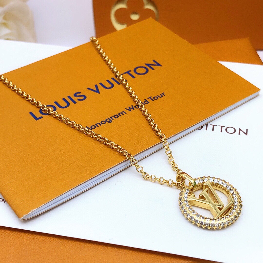 Martin Graham pendant necklace in polished metal-tone – side detail