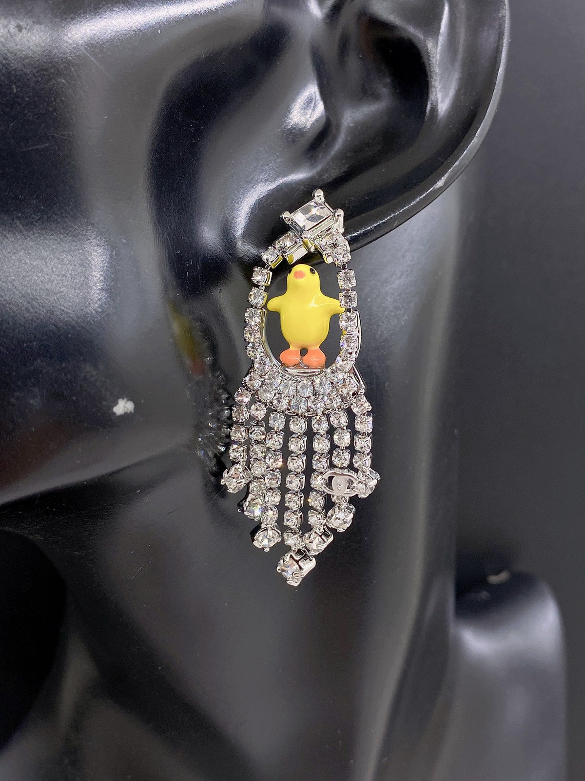Martin Graham earrings in polished metal-tone – front product view