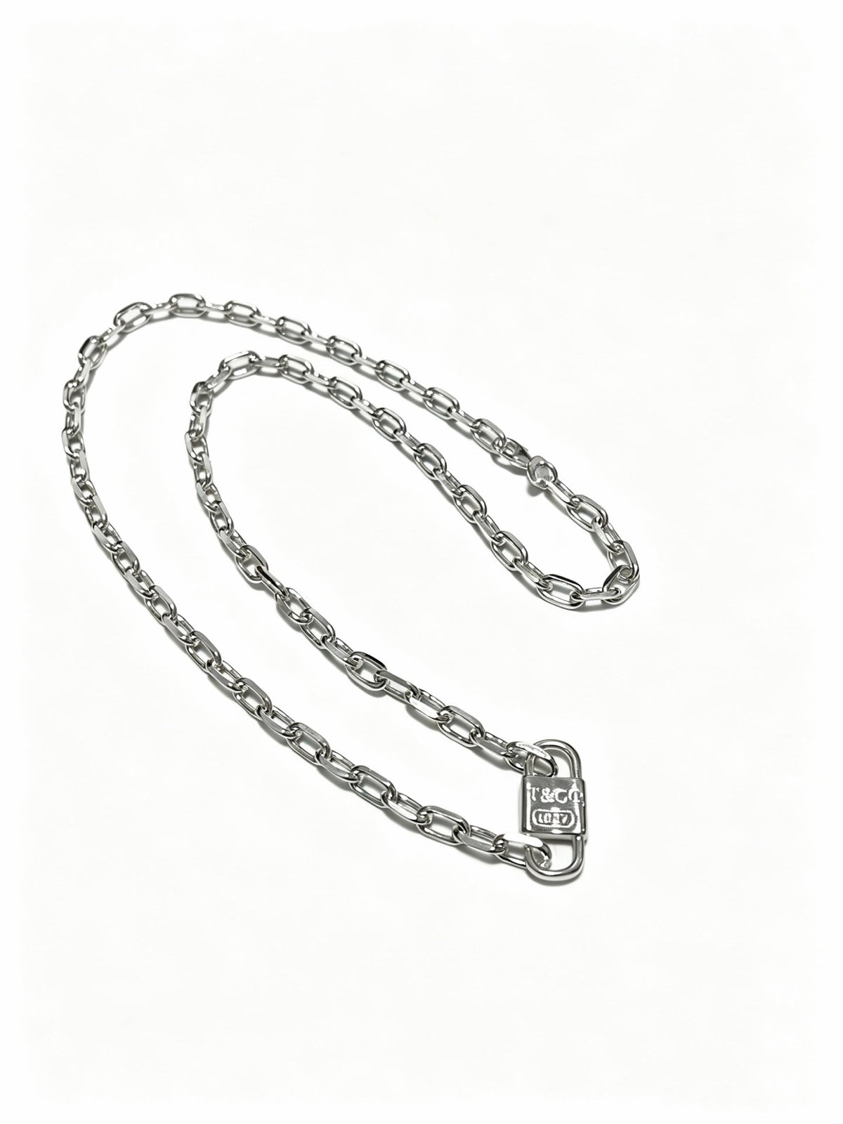 Martin Graham pendant necklace in polished metal-tone – front product view