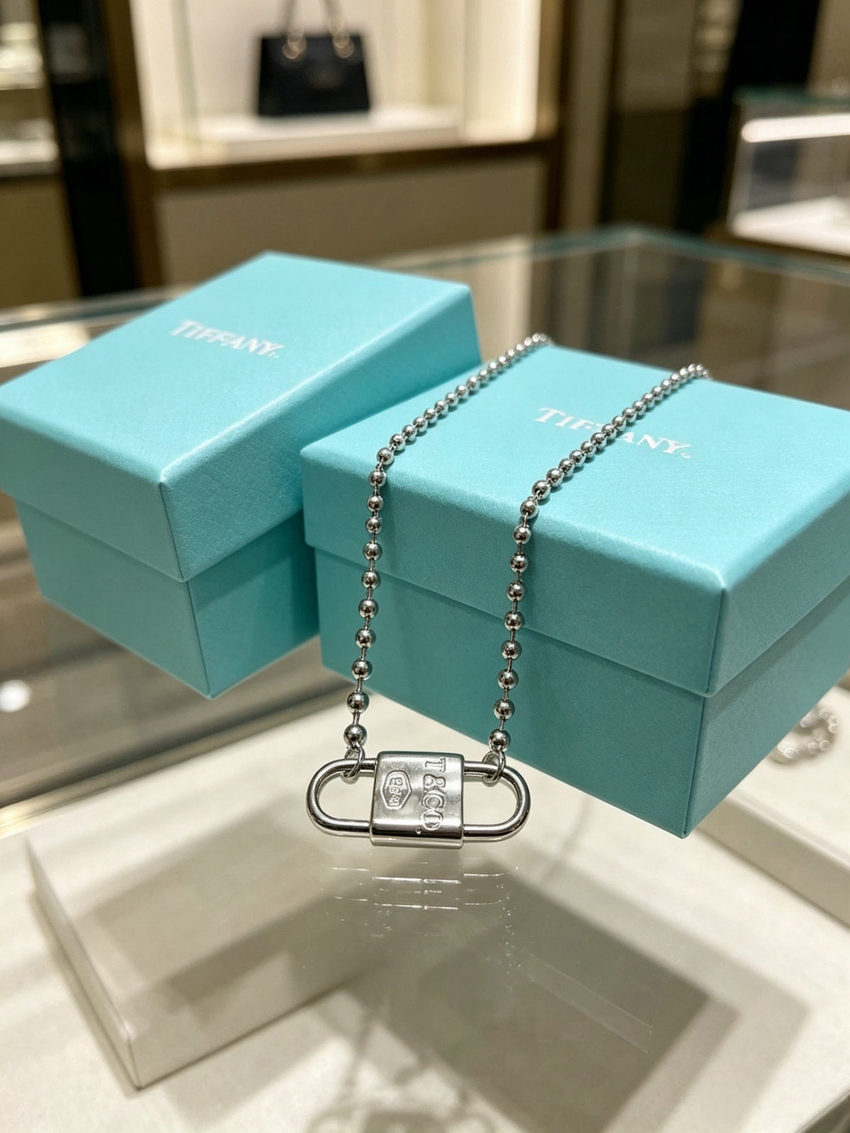 Martin Graham pendant necklace in polished metal-tone – main product view