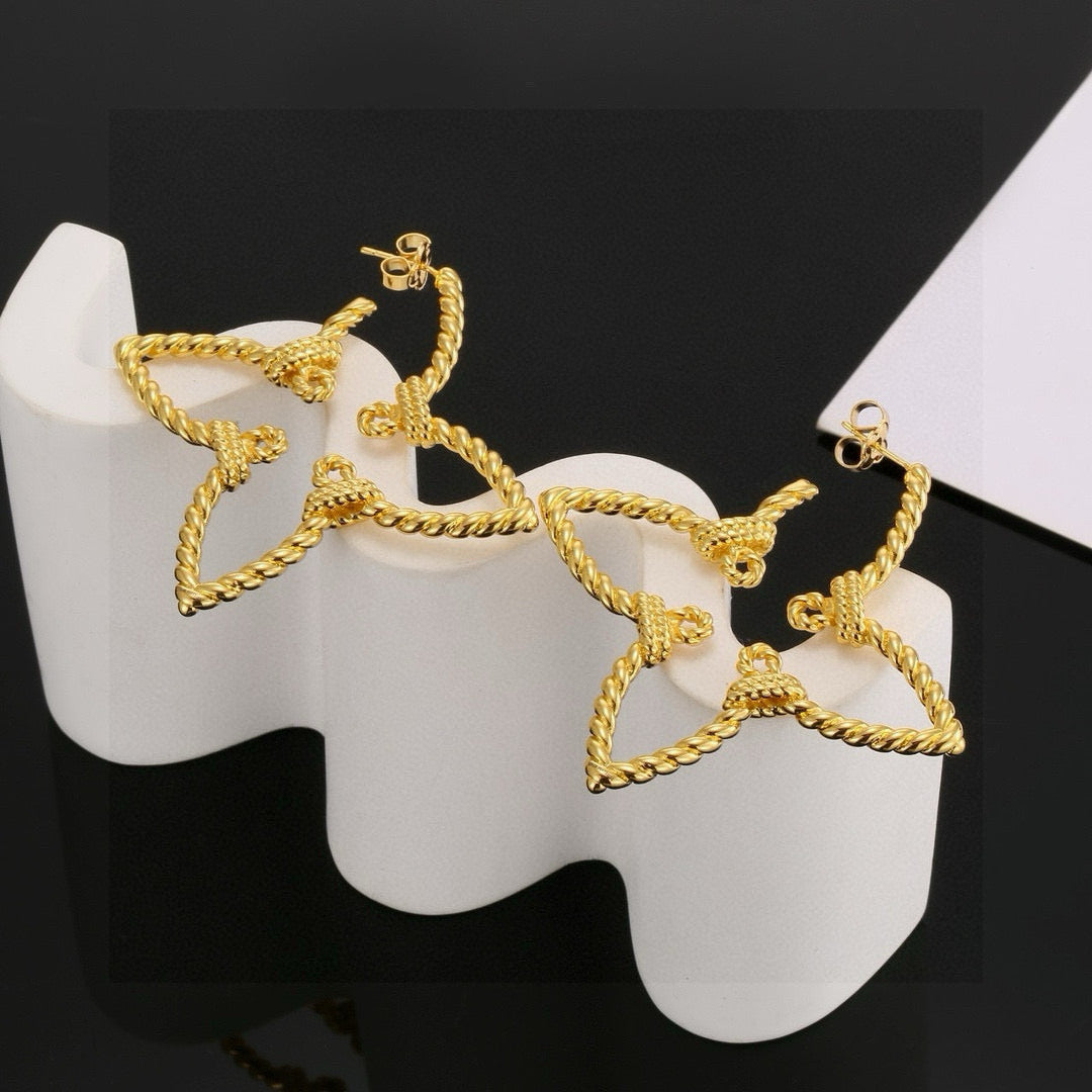 Martin Graham stud earrings in polished metal-tone – front product view