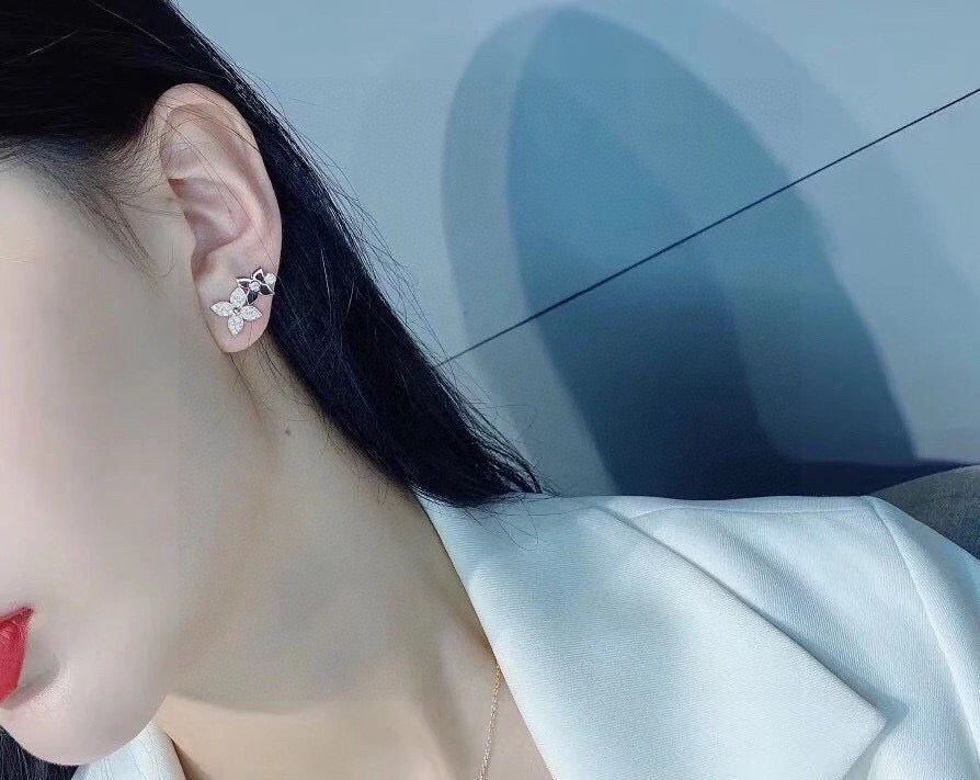 Martin Graham stud earrings in polished metal-tone – styled product view