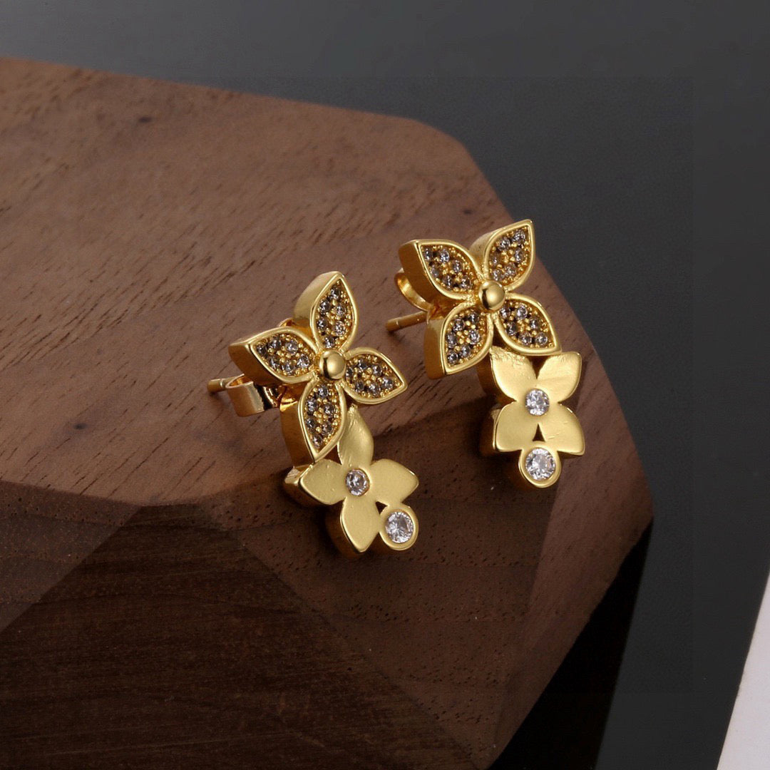 Martin Graham stud earrings in polished metal-tone – side detail