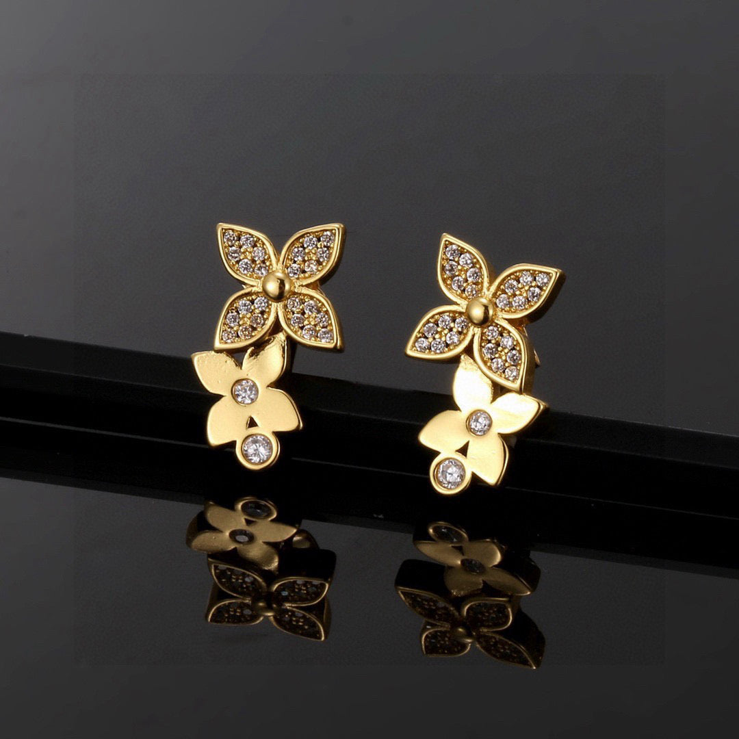 Martin Graham stud earrings in polished metal-tone – front product view