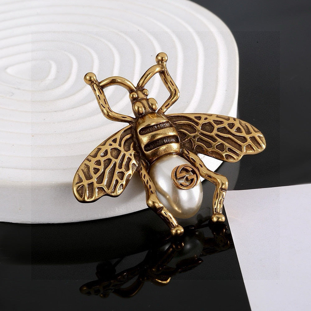 Martin Graham brooch in polished metal-tone – side detail