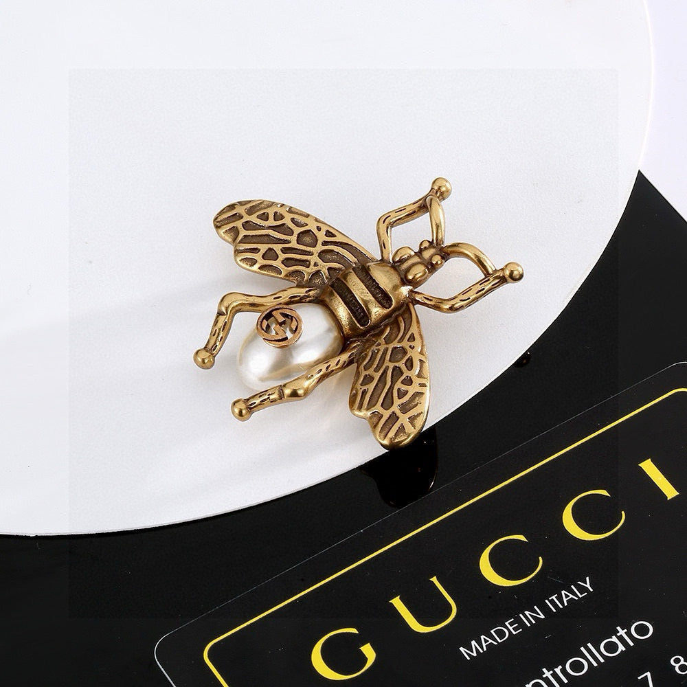 Martin Graham brooch in polished metal-tone – front product view