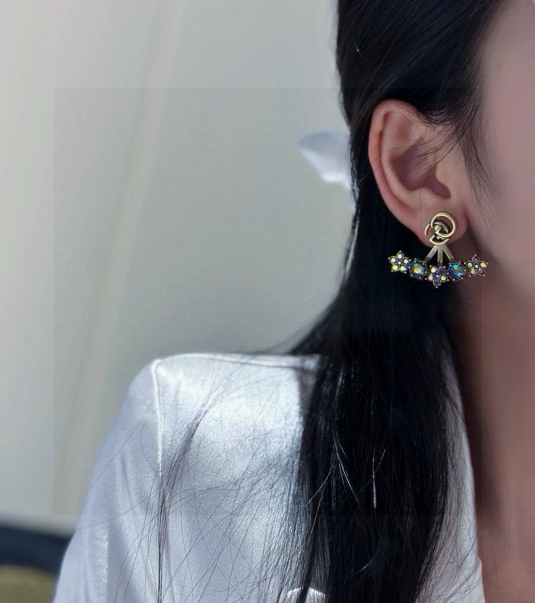 Martin Graham stud earrings in polished metal-tone – front product view