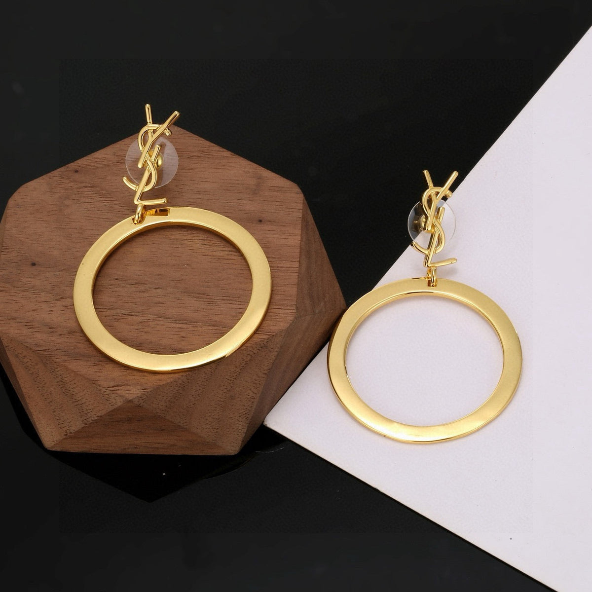 Martin Graham stud earrings in polished metal-tone – front product view