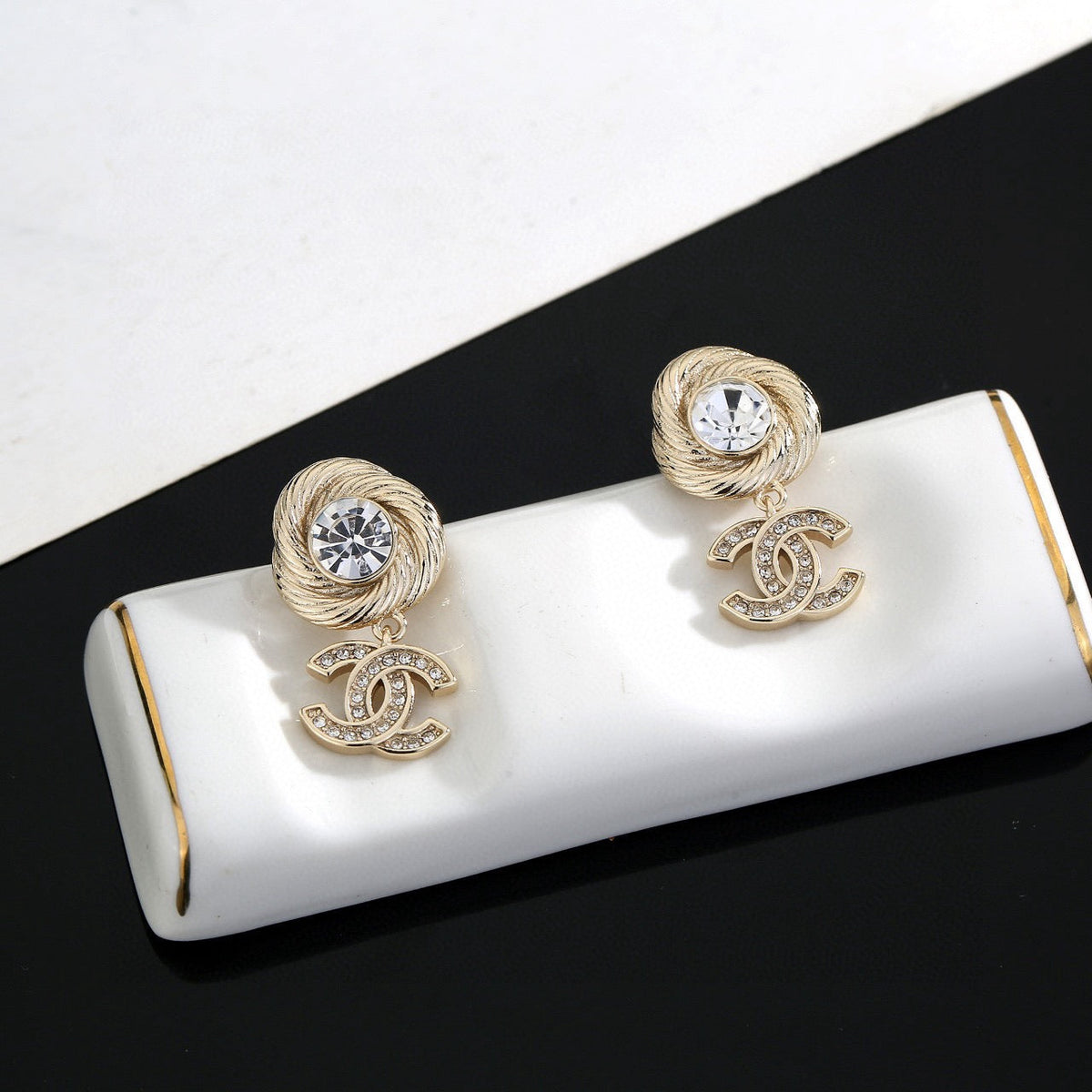 Martin Graham stud earrings in polished metal-tone – main product view