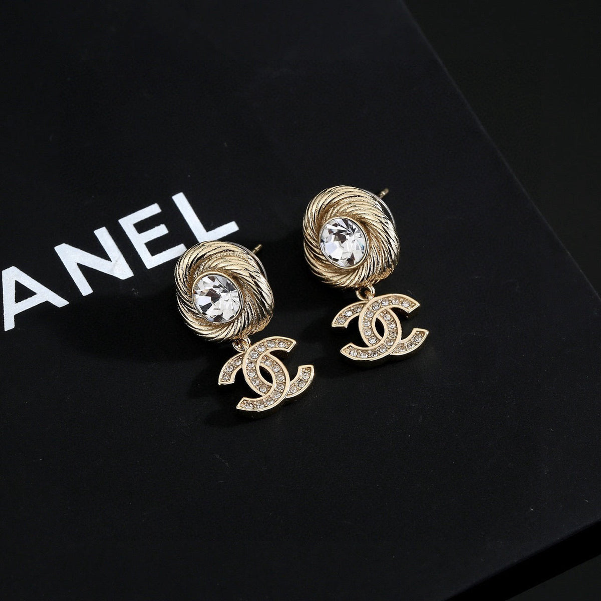 Martin Graham stud earrings in polished metal-tone – front product view