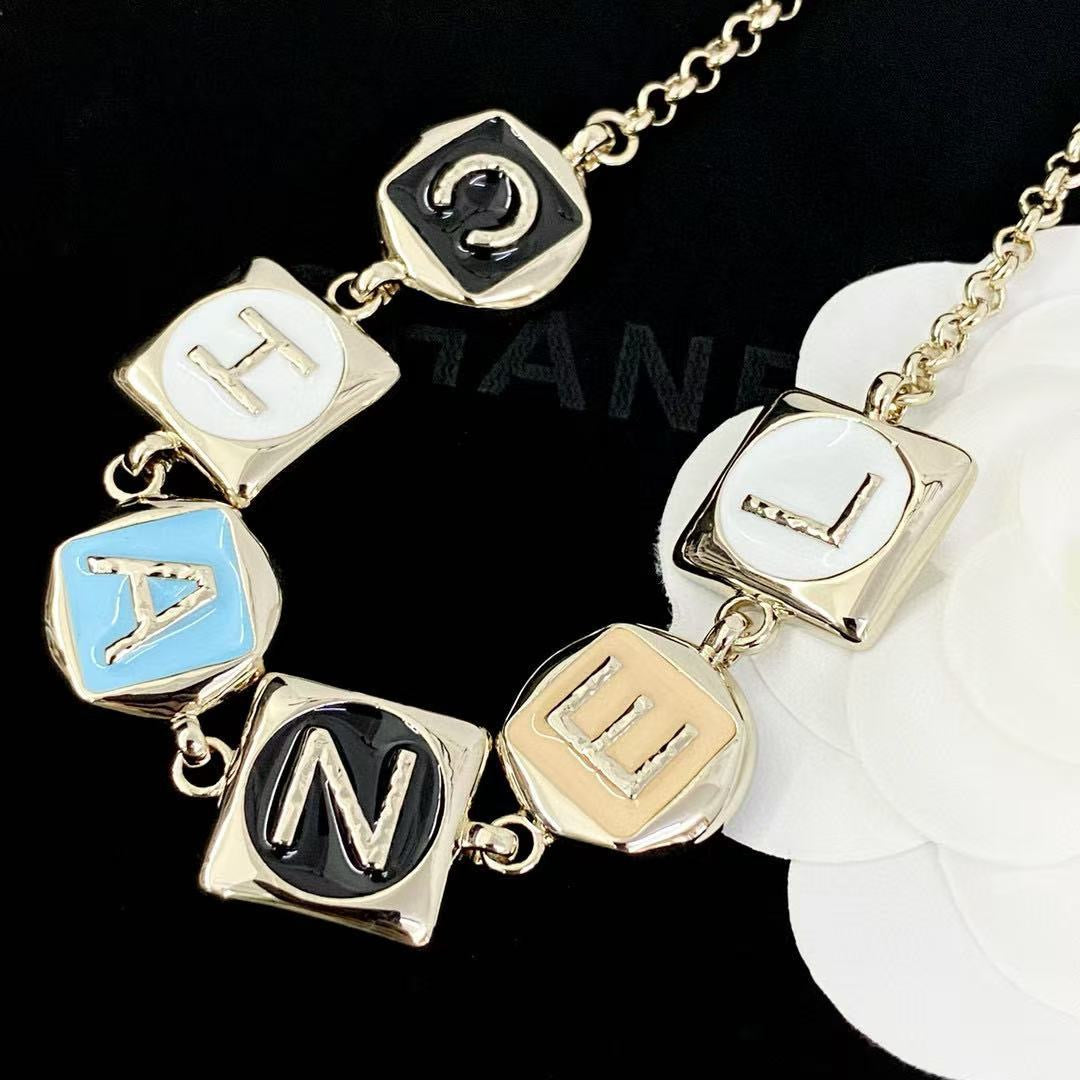 Martin Graham pendant necklace in polished metal-tone – front product view