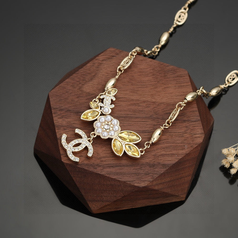 Martin Graham pendant necklace in polished metal-tone – styled product view
