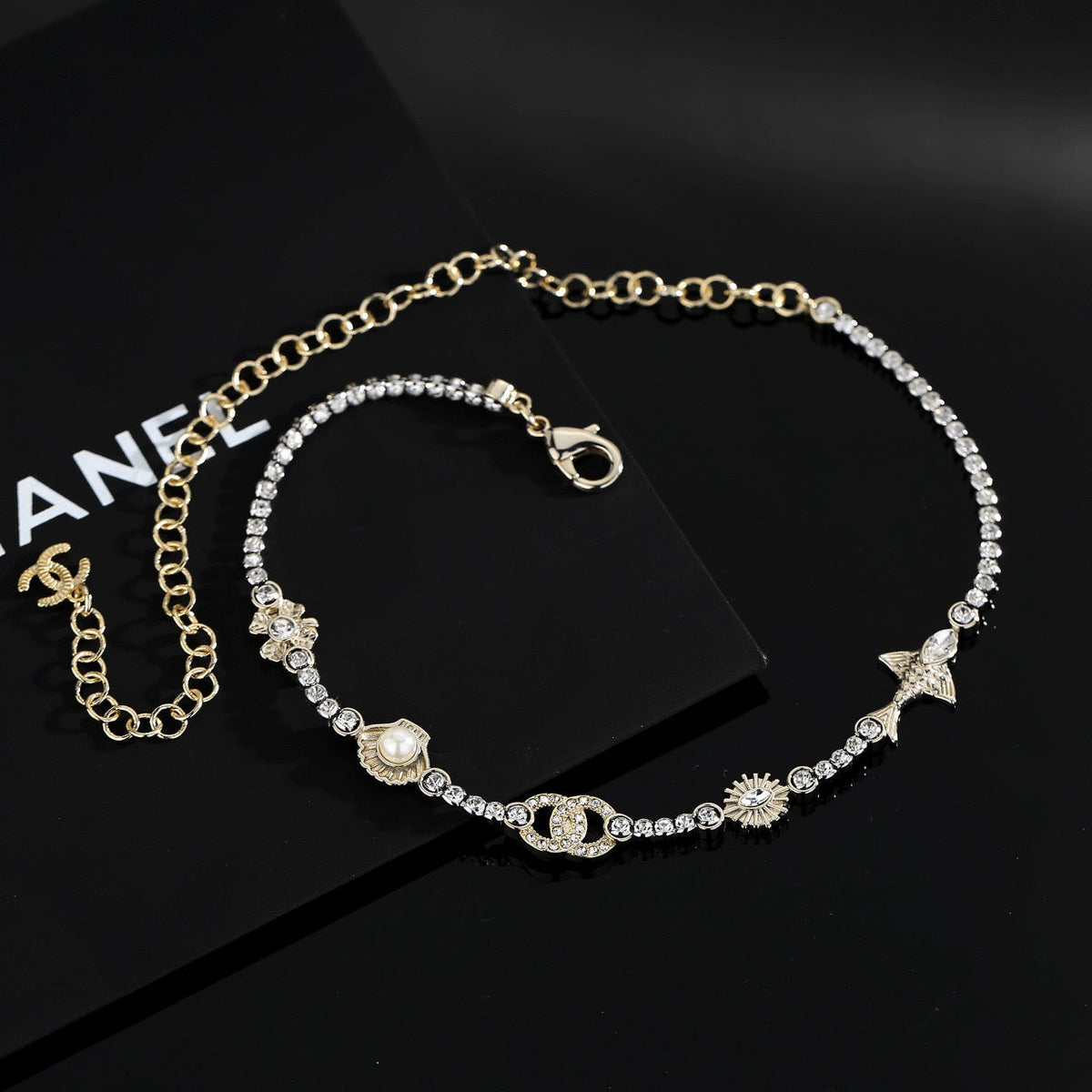 Martin Graham pendant necklace in polished metal-tone – front product view