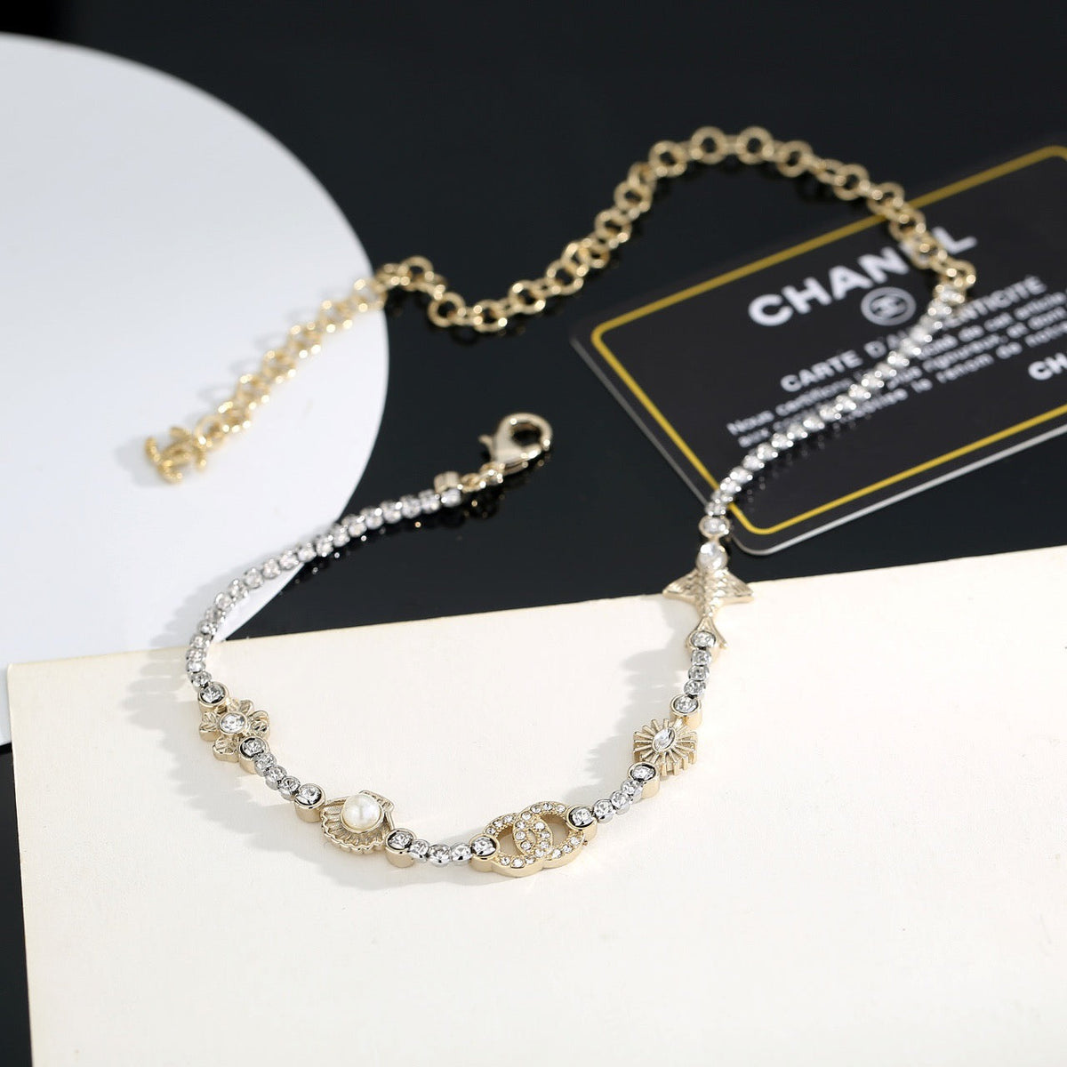 Martin Graham pendant necklace in polished metal-tone – close-up detail