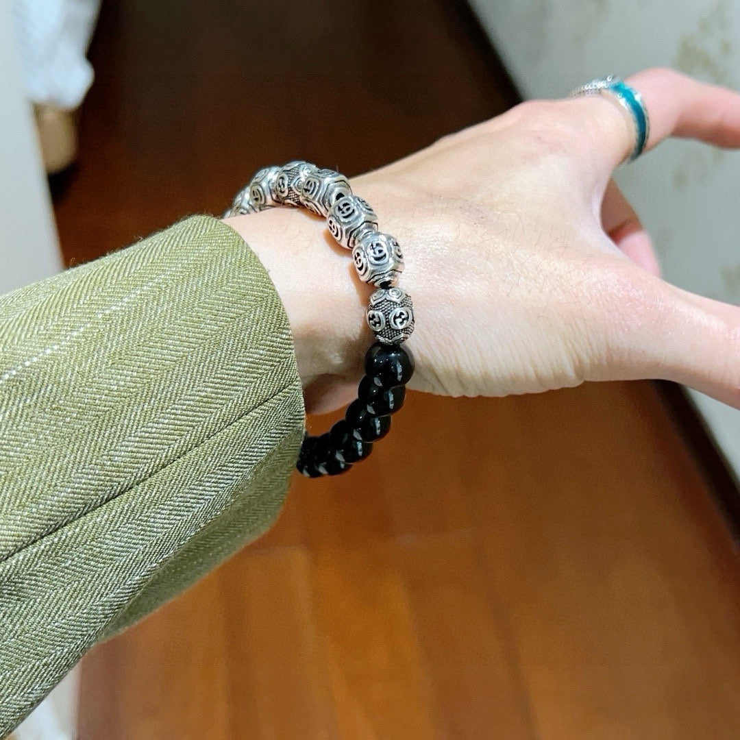 Martin Graham bracelet in polished metal-tone – side detail