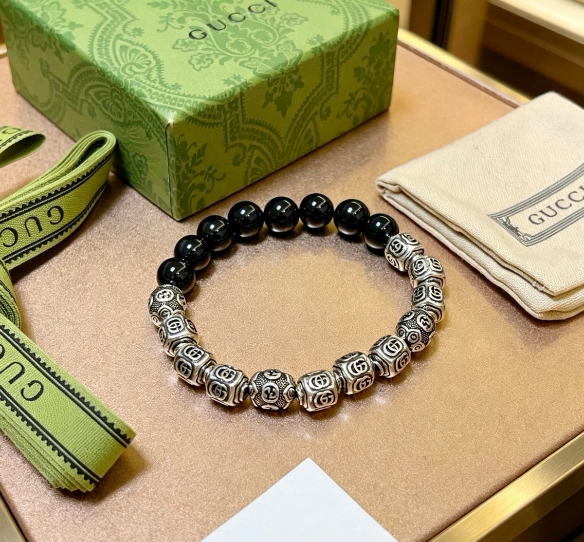 Martin Graham bracelet in polished metal-tone – close-up detail