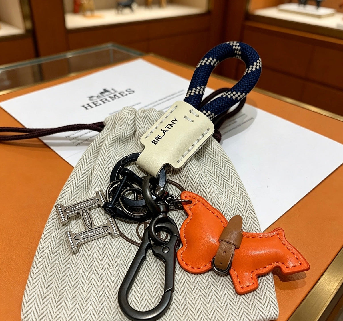 Martin Graham keychain in polished metal-tone – detail view
