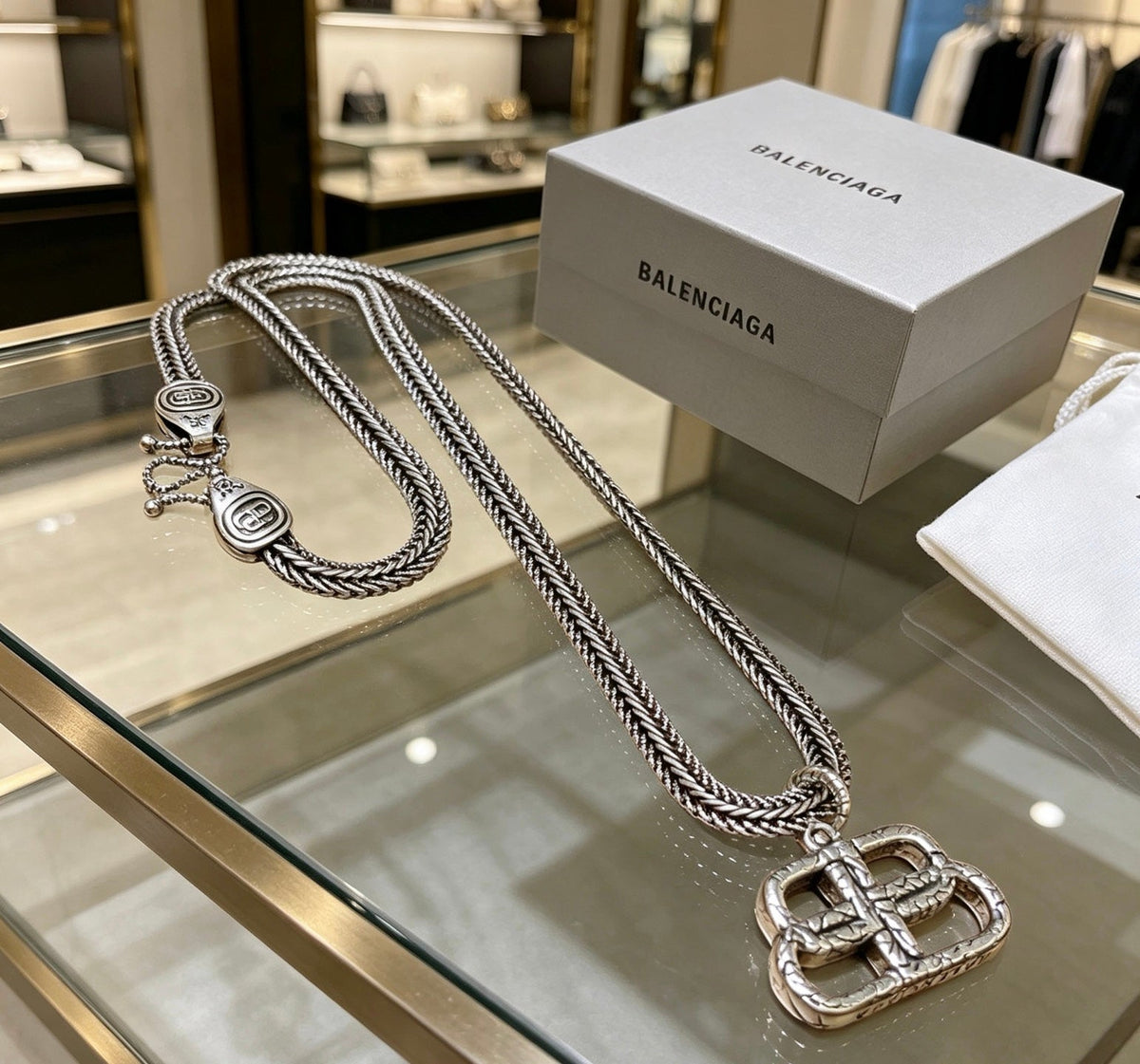 Martin Graham pendant necklace in polished metal-tone – detail view