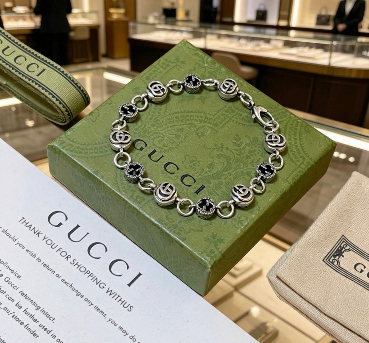 Martin Graham bracelet in polished metal-tone – close-up detail