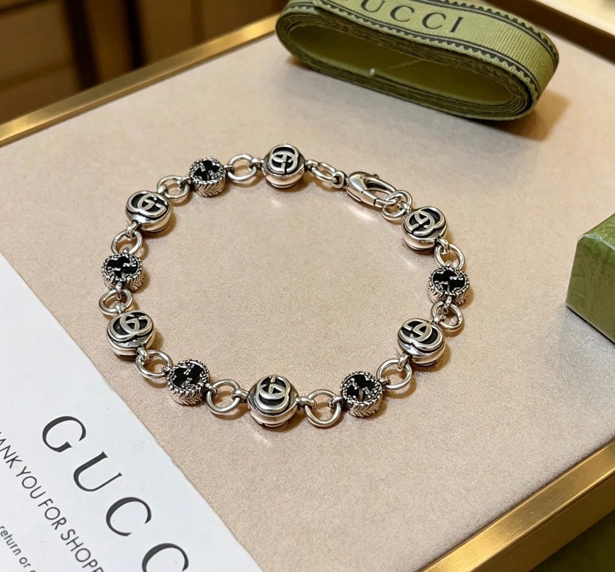 Martin Graham bracelet in polished metal-tone – side detail