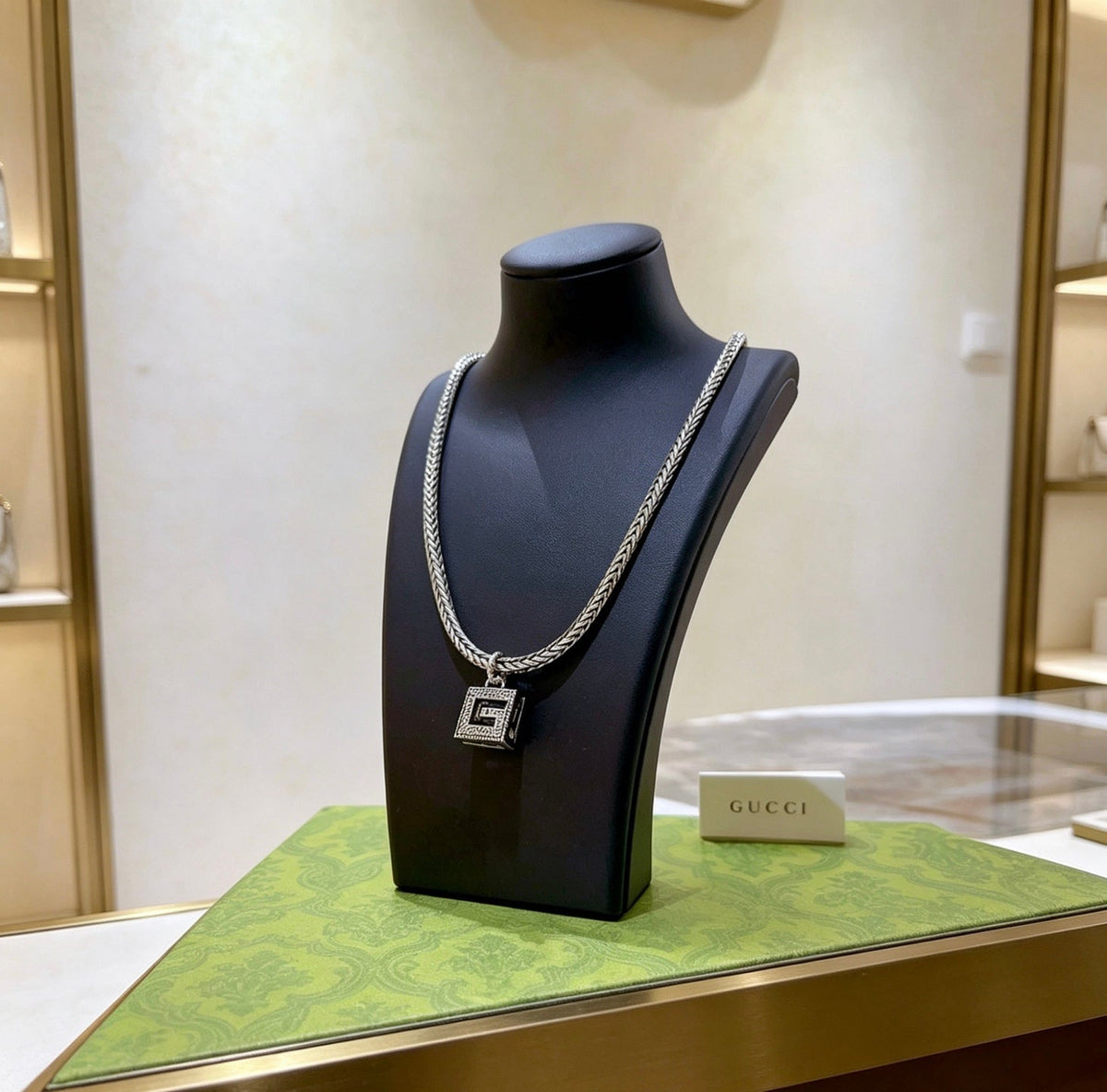 Martin Graham pendant necklace in polished metal-tone – front product view