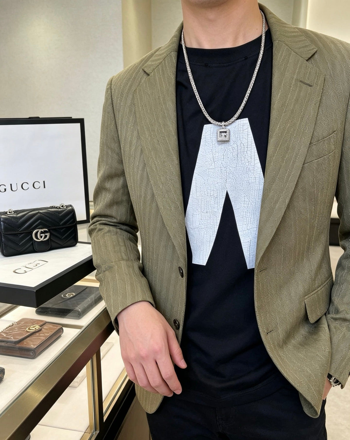 Martin Graham pendant necklace in polished metal-tone – front product view