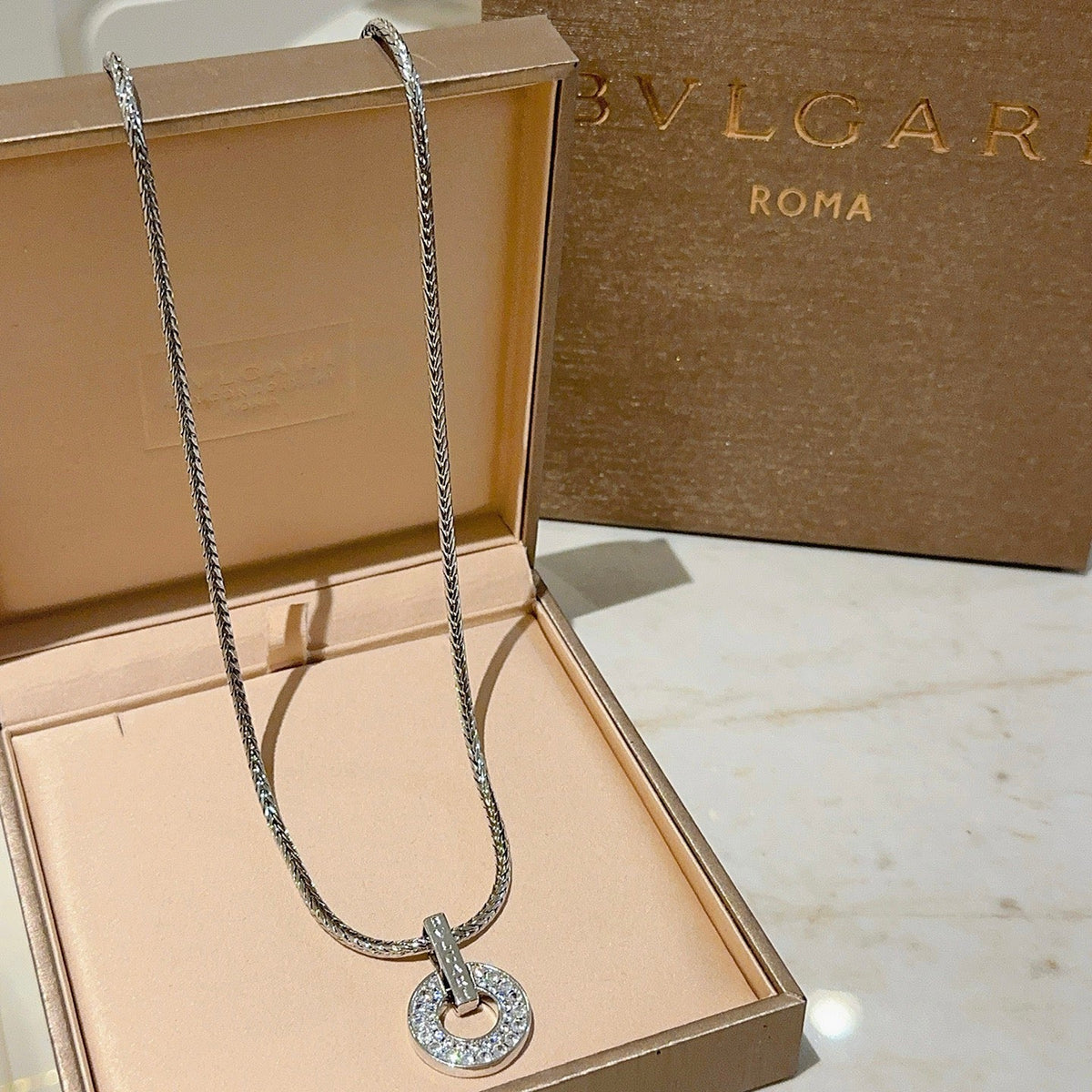 Martin Graham pendant necklace in polished metal-tone – detail view
