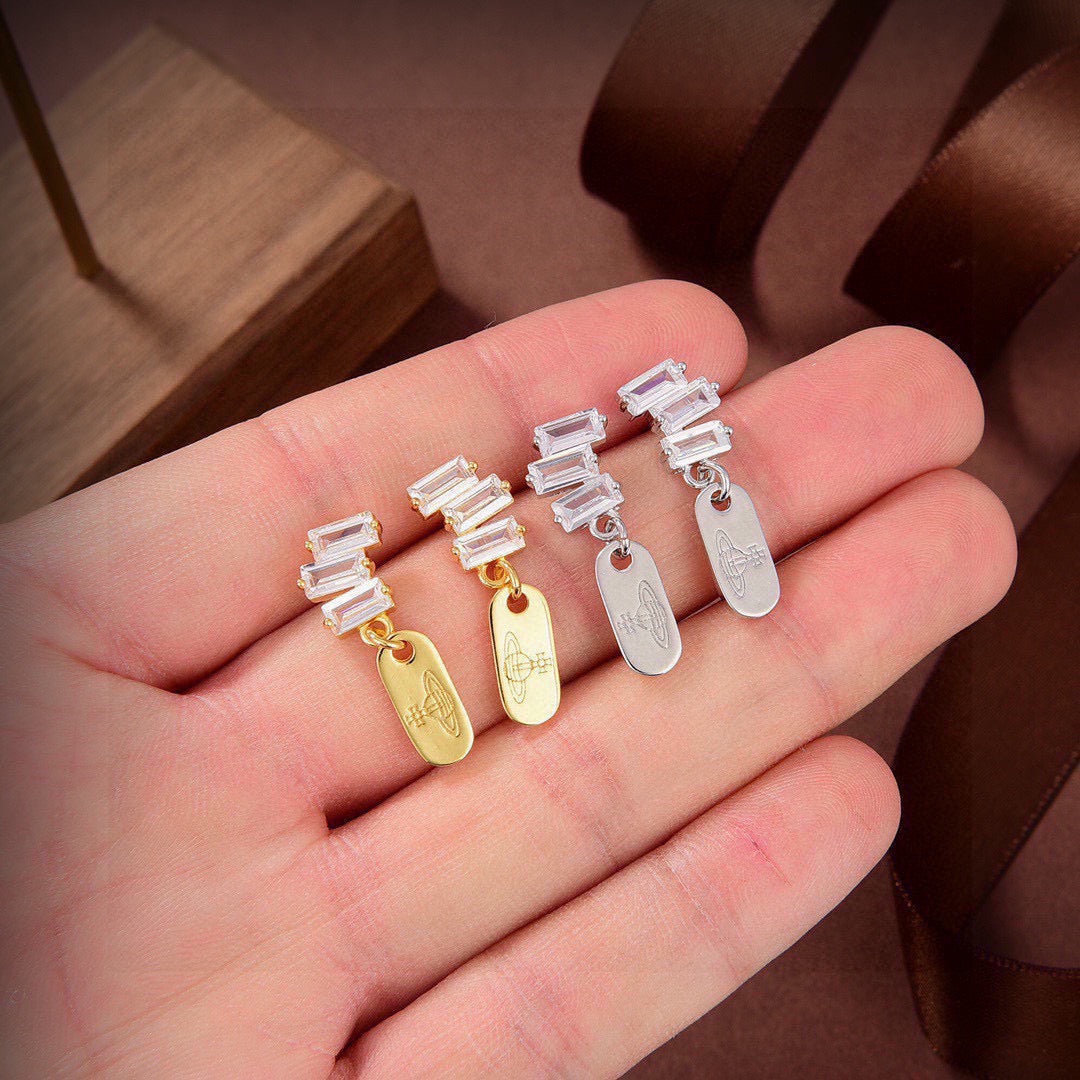 Martin Graham stud earrings in polished metal-tone – side detail