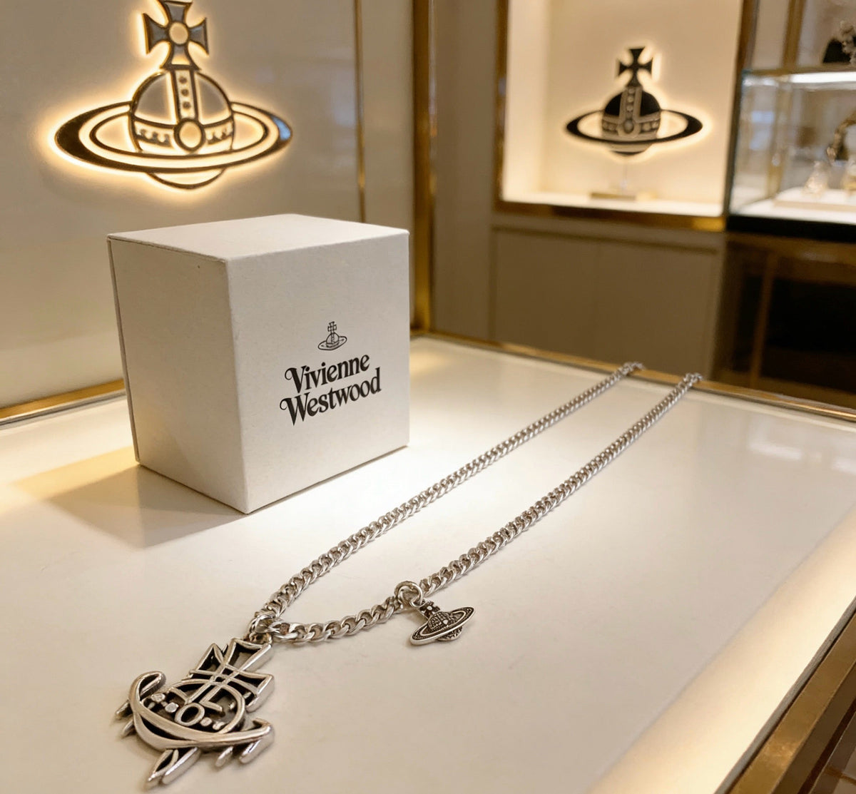 Martin Graham pendant necklace in polished metal-tone – detail view