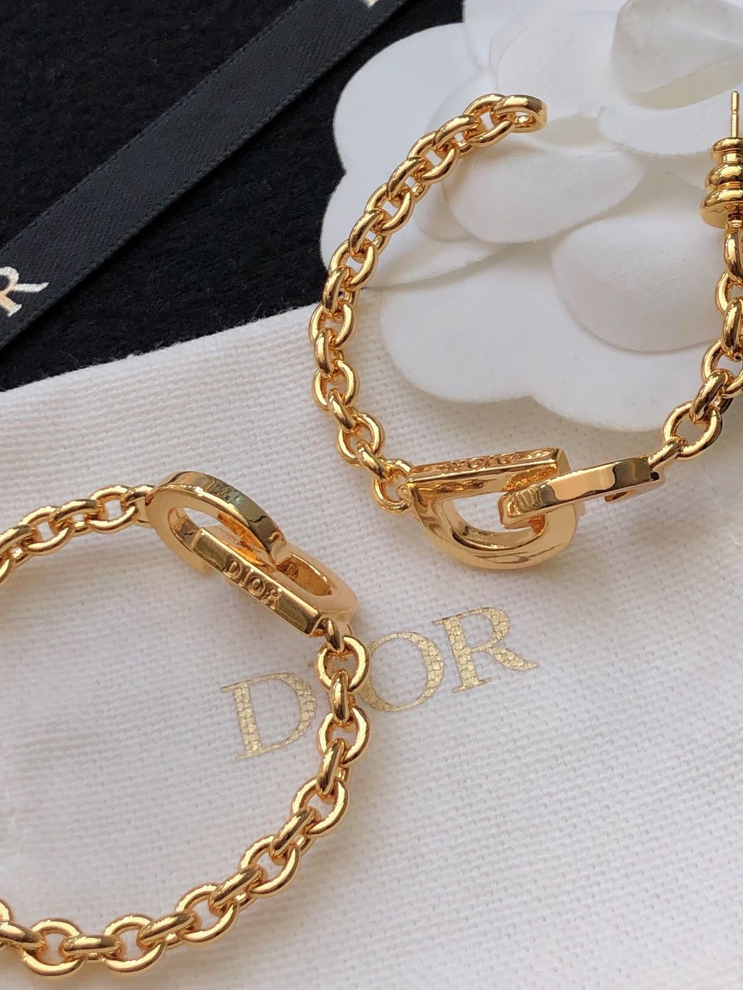 Martin Graham earrings in polished metal-tone – front view