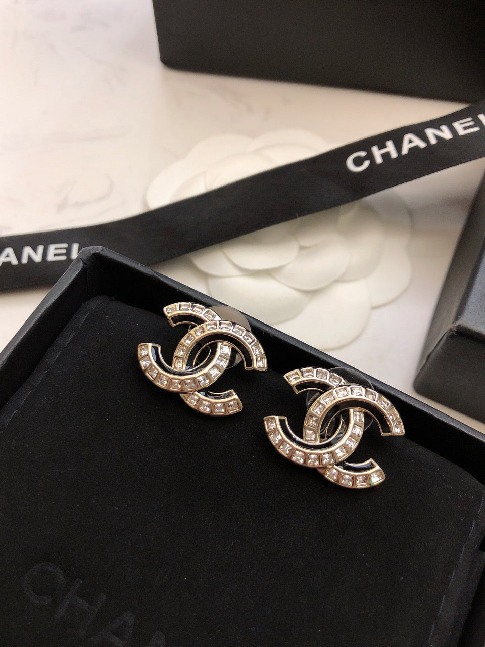 Martin Graham stud earrings in polished metal-tone – front product view