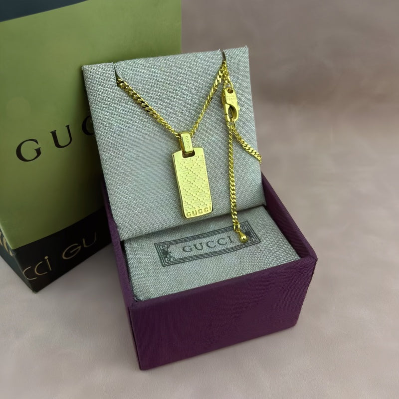 Martin Graham pendant necklace in polished metal-tone – side detail