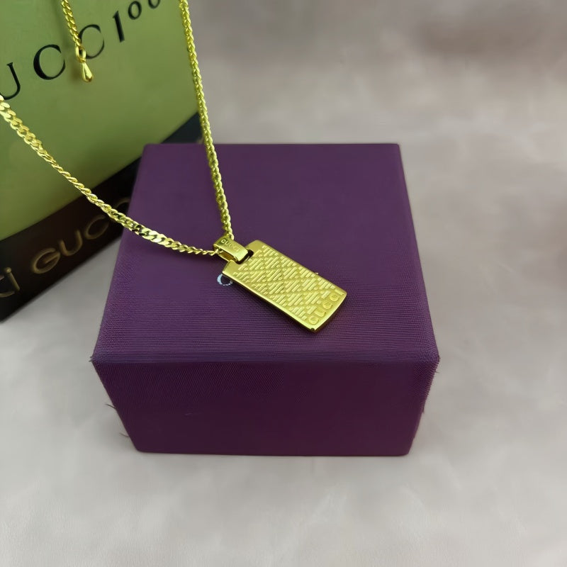 Martin Graham pendant necklace in polished metal-tone – styled product view