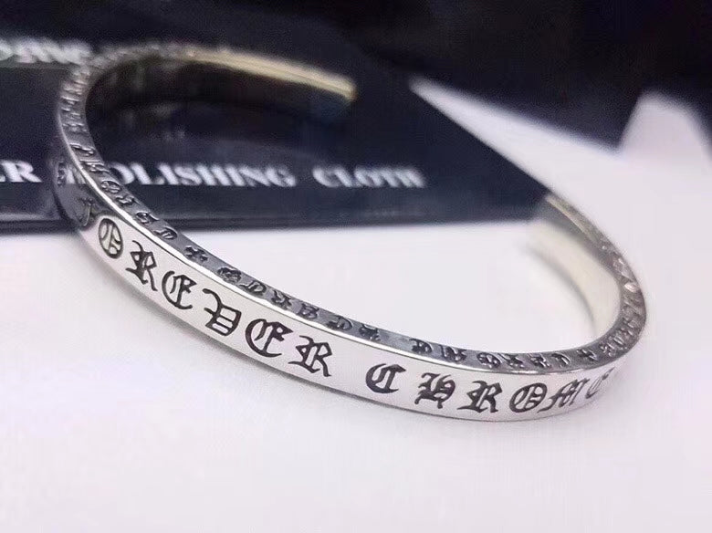 Martin Graham bangle in polished metal-tone – close-up detail